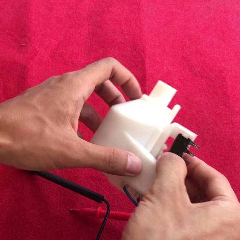 Kiểm tra phao của máy rửa bát